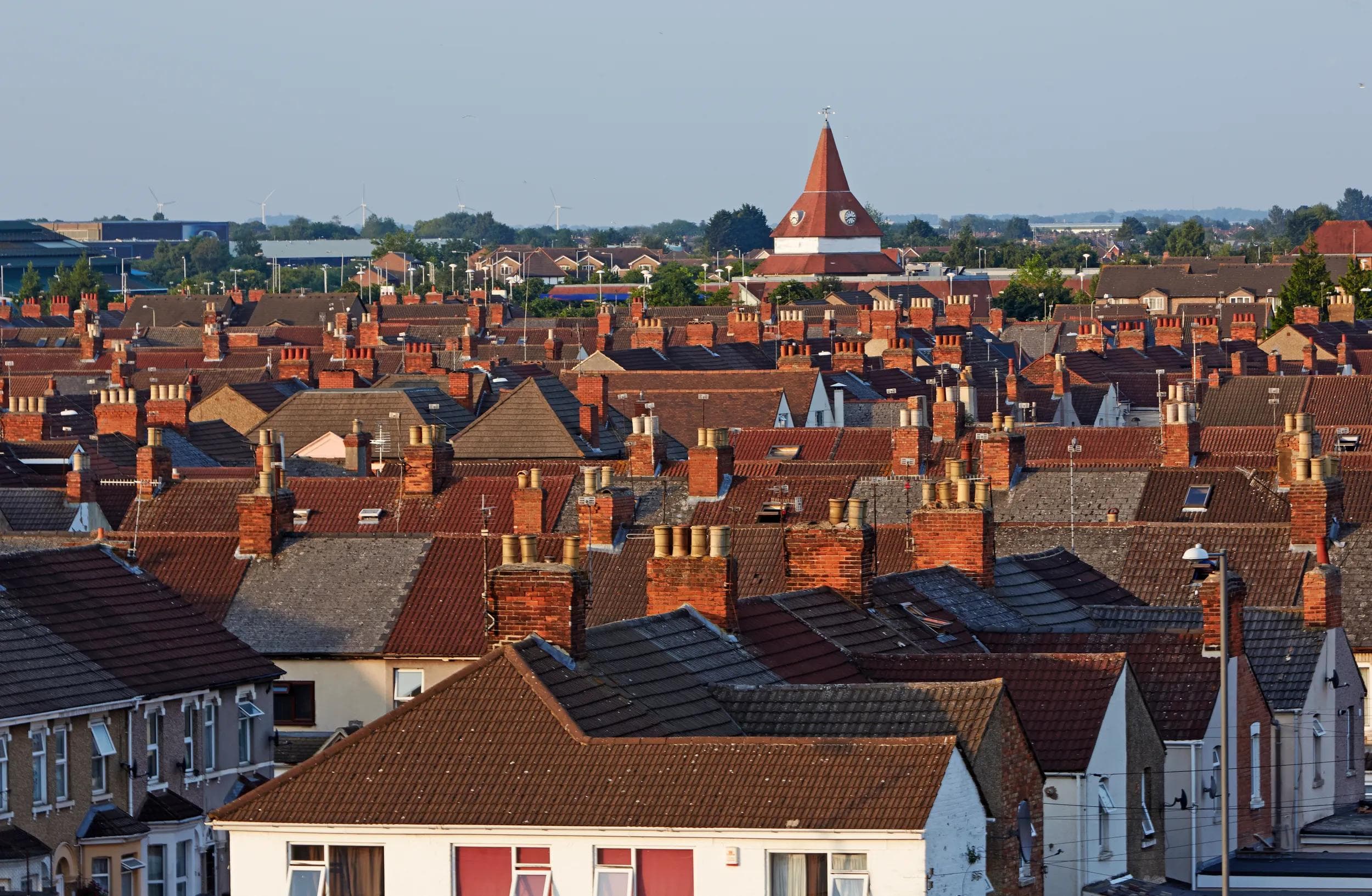 Elevated view of rooftops in Swindon, Wiltshire at sunset